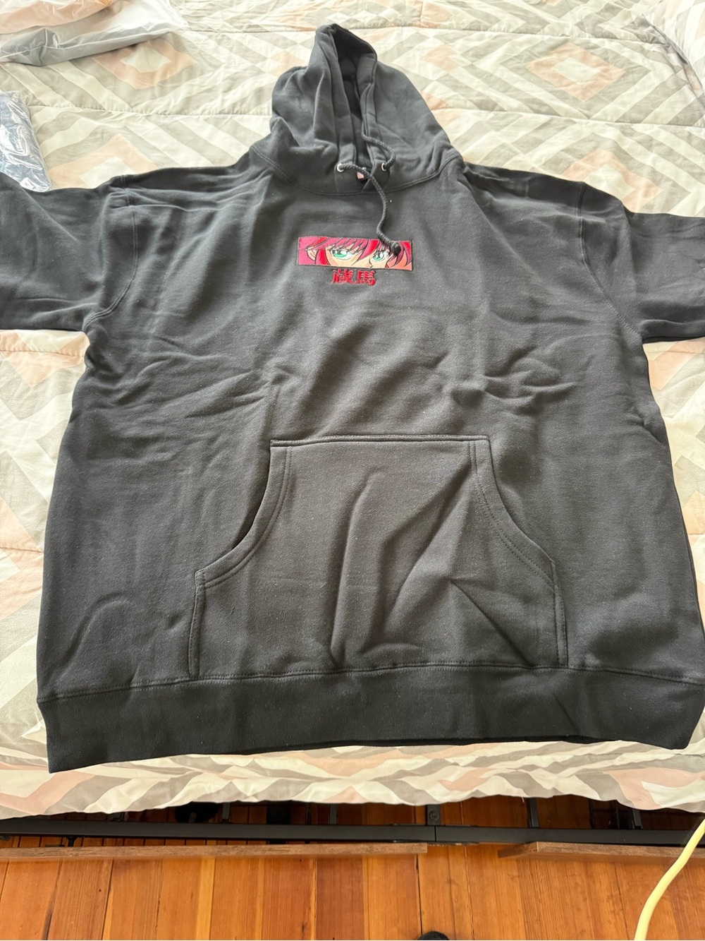 Hypland Black Hoodie with Pink Anime Eye Graphic